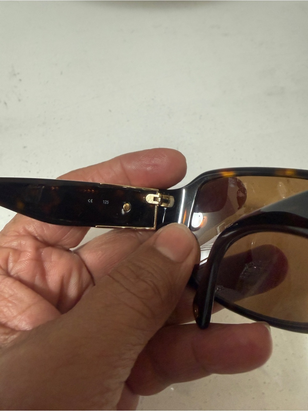 Coach Nina S494Tortoise Sunglasses featuring a dark brown tortoiseshell frame - Picture 15 of 16